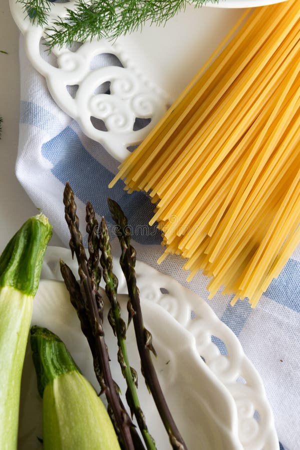 Cooking Spaghetti and Vegetables Wild Asparagus, Dill and Zucchini