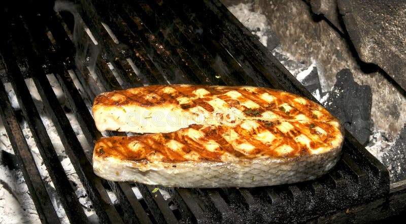 Cooking steak grilled salmon