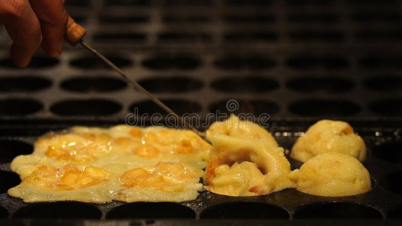 The Cooking of Takoyaki. the Popular Japanese Street Food. Stock Image