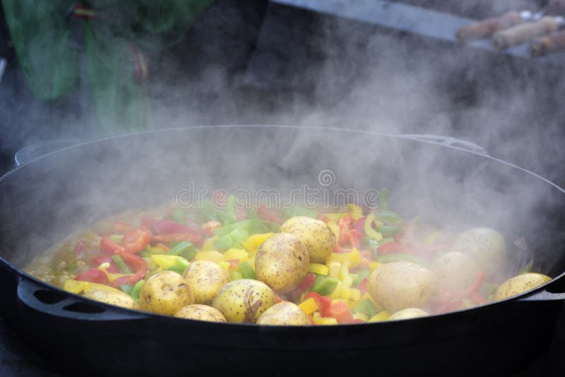 Cooking Vegetables in Large Cast Iron Cauldron Stock Photo Image of