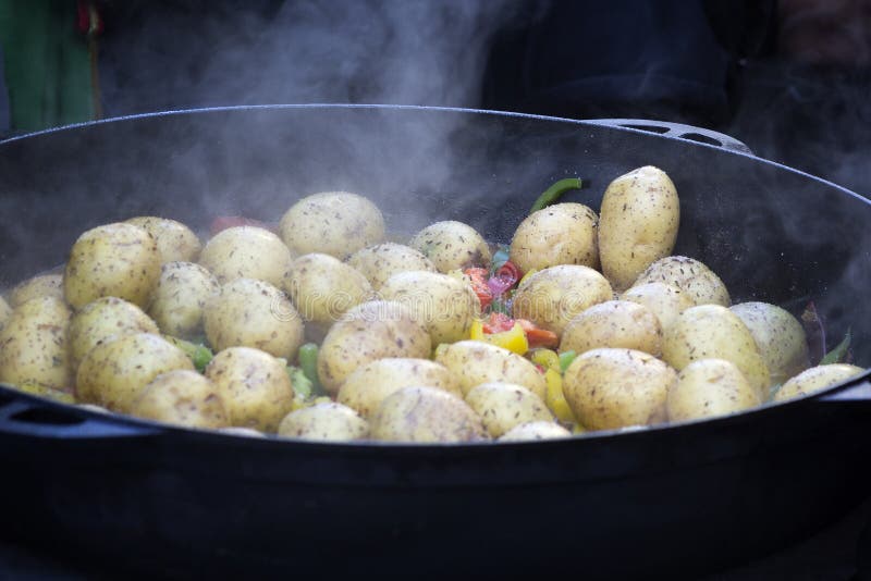 Cooking Vegetables in Large Cast Iron Cauldron Stock Image Image of