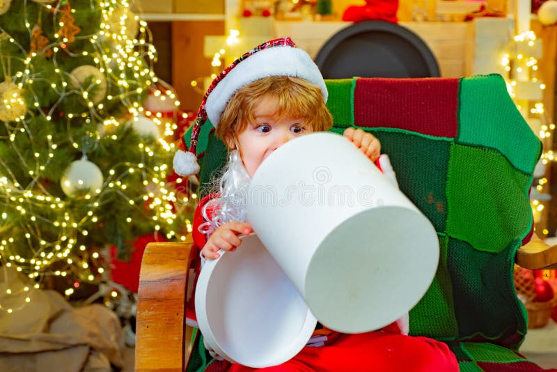 Cool Christmas surprise. Happy boy opened a gift. A dream for children. Christmas gifts for happiness. royalty free stock photos Cool Christmas surprise. Happy boy opened a gift. A dream for children. Christmas gifts for happiness. royalty free stock photos