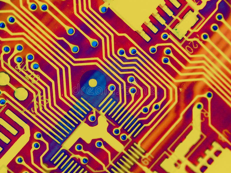 Abstraktné štruktúry dielce počítača circuitboard v žiari červenej, zlatej a modrej farby ideálne ako pozadie alebo vzor.