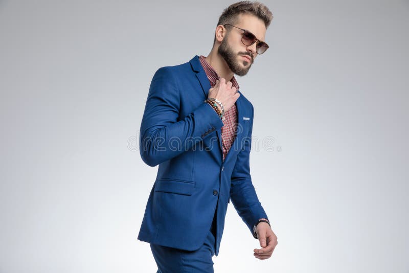 Cool Fashion Guy Adjusting Shirt and Walking Stock Photo - Image of ...