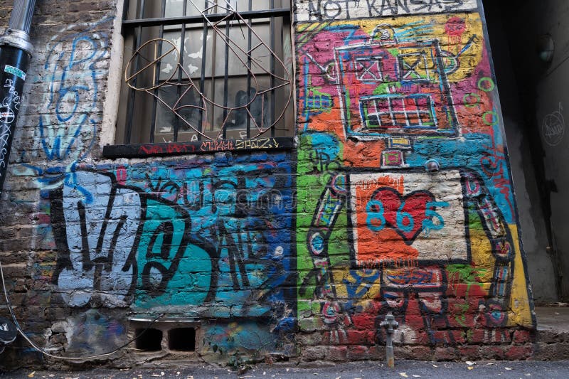 Cool Graffiti, Street Murals on a Wall Under the Lights Editorial