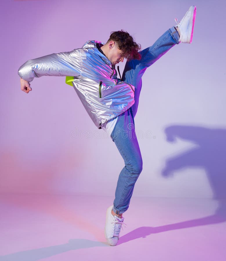 Cool Guy Dancing Contemporary Dance in Studio. Neon Light Background ...