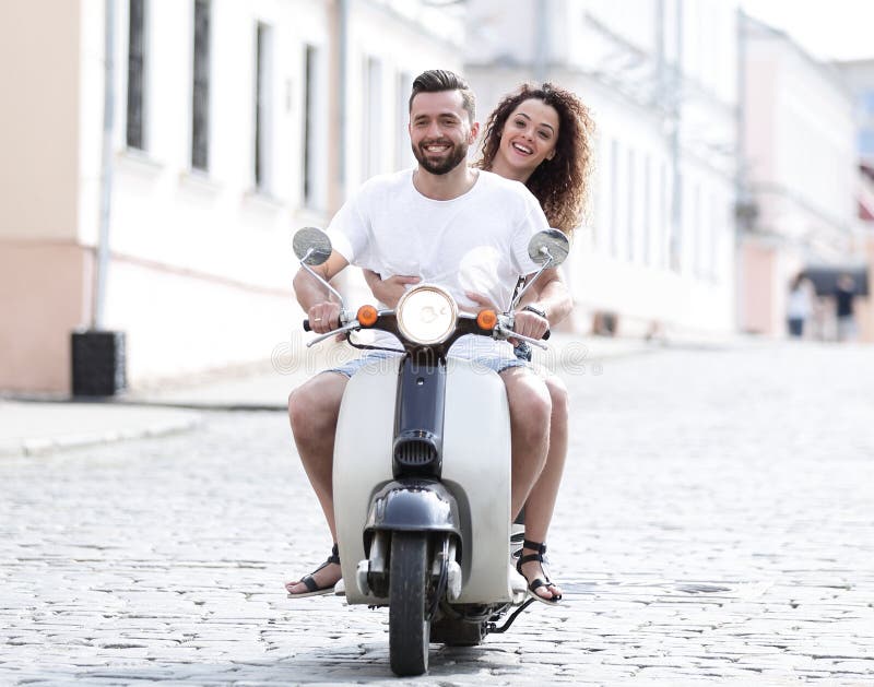 Cool Man and Beautiful Girl Riding on Scooter with Expression Stock ...