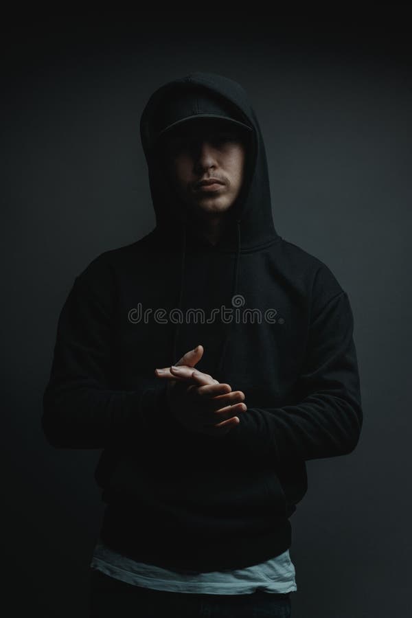 Cool Rapper with Black Hoodie and Cap Clapping His Hands in Front of Grey  Background Stock Image - Image of dramatic, model: 220946659