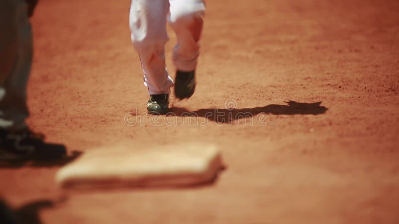 Cool shot of little kids running the bases during a baseball game