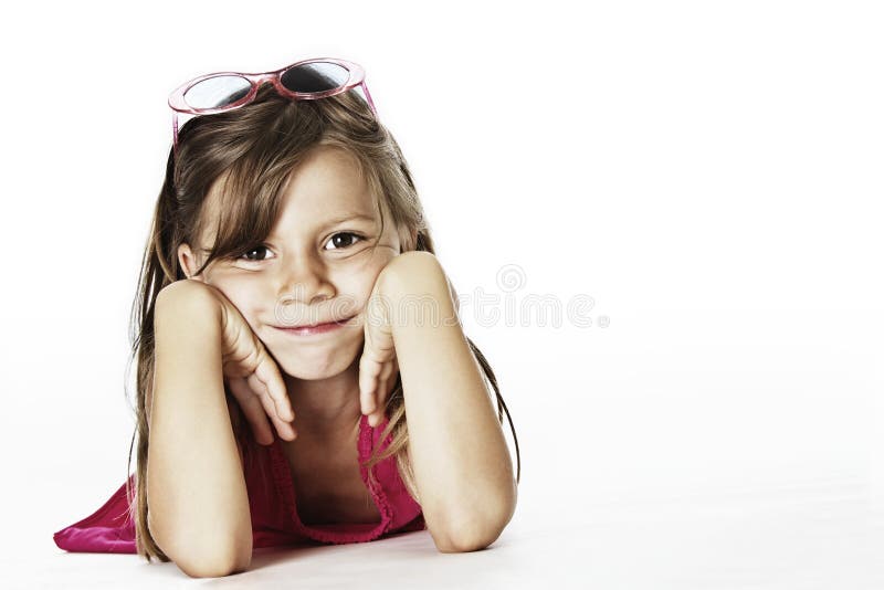 Cool toddler with sunglases in studio