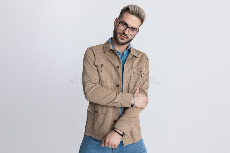 Unshaved Fashion Model In Jacket Standing In A Fashion Pose Stock Photo ...