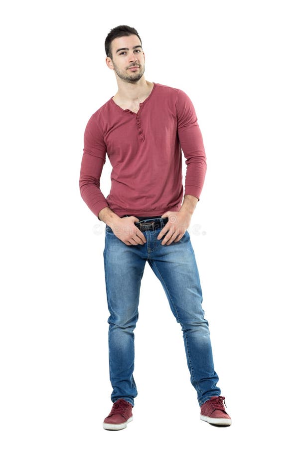 Male model with perfect body in jeans posing over grey background.  Close-up. Studio shot. Stock Photo | Adobe Stock