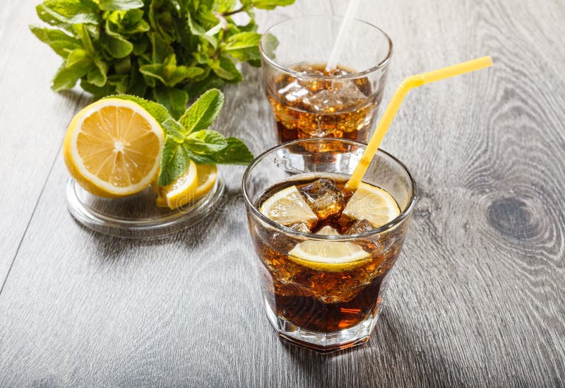 The Cooling Drink with Ice, Lemon and Mint. Stock Photo Image of leaf