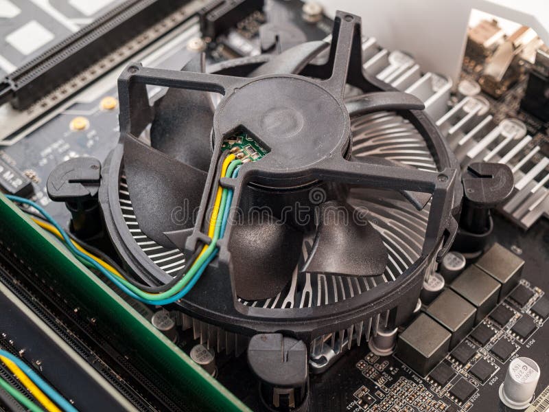 Cooling fan with cpu in the computer system unit, cooling the computer air, repair and upgrade, cooling computer stock photos