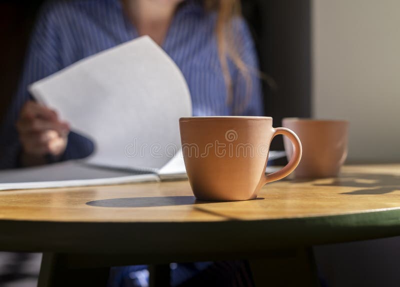 Cooncept of Preparing for Exam, Reading Book, Studying Textbook in Cafe