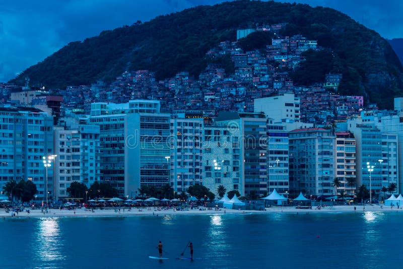 Copacabana is one of the most emblematic beaches in Brazil! It became famous and today is one of the biggest points of interest in Rio de Janeiro. Its greenish and icy waters are a refuge from the summer heat in the city.

Always very busy, the beach in Rio reflects a little of what Rio de Janeiro is, a high-spirited place with a unique natural beauty! The beach is long and has a long stretch of sand, which during the summer is crowded with people. The boardwalk, made with black and white Portuguese stones, is another symbol of the place.

Along the beach there are several kiosks, many people playing sports, street vendors and a bicycle lane. It is well worth taking a moment of the trip to stroll around, ride a bike and cool off with a coconut water enjoying the sea view. Another tip is to visit Copacabana Fort and also take pictures with the statue of Carlos Drummond de Andrade, at the time of post 6. Copacabana is one of the most emblematic beaches in Brazil! It became famous and today is one of the biggest points of interest in Rio de Janeiro. Its greenish and icy waters are a refuge from the summer heat in the city.

Always very busy, the beach in Rio reflects a little of what Rio de Janeiro is, a high-spirited place with a unique natural beauty! The beach is long and has a long stretch of sand, which during the summer is crowded with people. The boardwalk, made with black and white Portuguese stones, is another symbol of the place.

Along the beach there are several kiosks, many people playing sports, street vendors and a bicycle lane. It is well worth taking a moment of the trip to stroll around, ride a bike and cool off with a coconut water enjoying the sea view. Another tip is to visit Copacabana Fort and also take pictures with the statue of Carlos Drummond de Andrade, at the time of post 6.