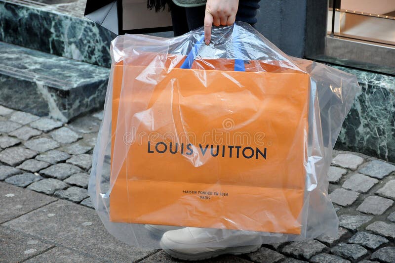 Shopping Bags With Louis Vuitton Logo. Editorial Shopping Related 3D  Rendering Stock Photo, Picture and Royalty Free Image. Image 139325544.