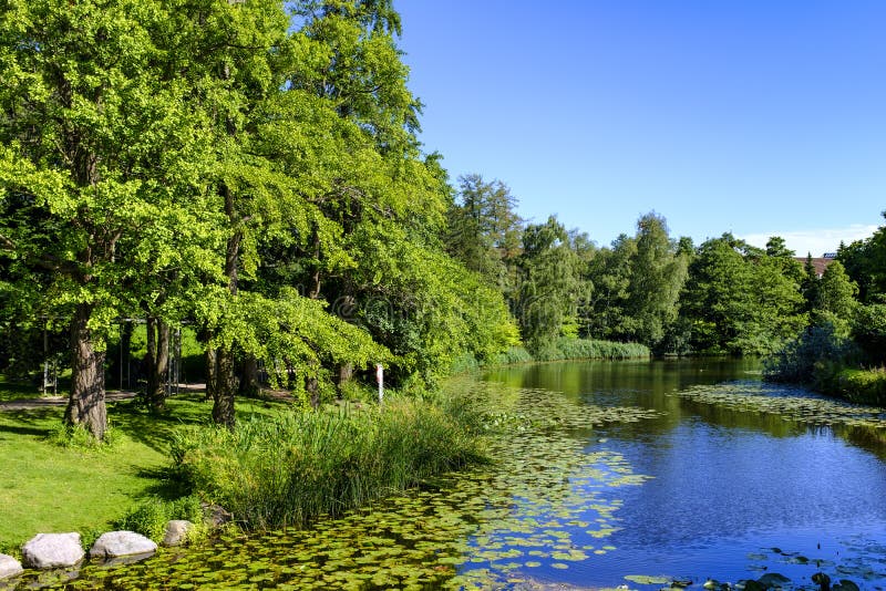 Copenhagen, Zealand region / Denmark - 2017/07/26: city center - University Botanical Garden with park outdoor exposition. Copenhagen, Zealand region / Denmark - 2017/07/26: city center - University Botanical Garden with park outdoor exposition