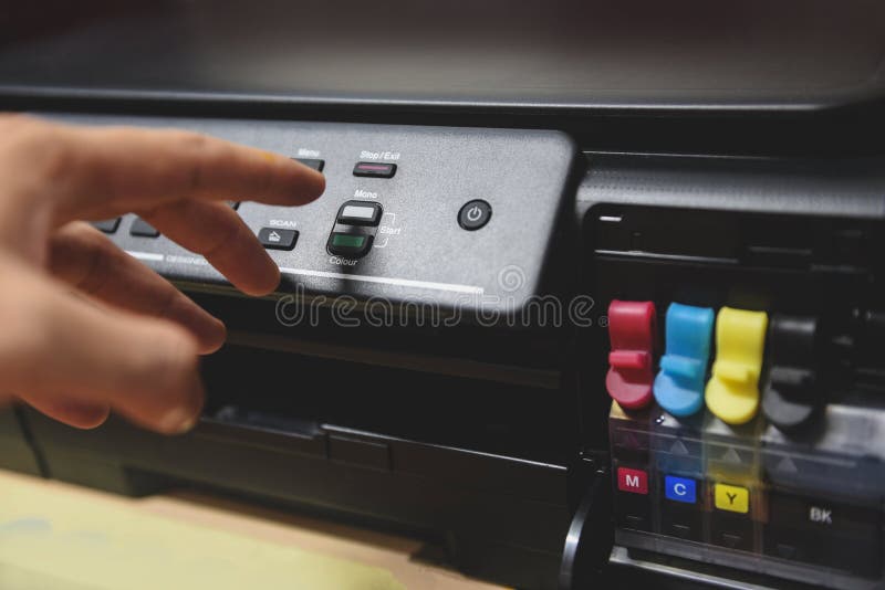 Copier concept - Business man hand press button on panel on printer ink for scanner copy machine supplies at office stock photos Copier concept - Business man hand press button on panel on printer ink for scanner copy machine supplies at office stock photos