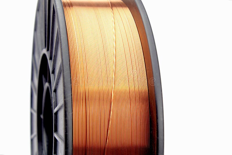 Copper Coated Steel Wire on a Plastic Spool. Welding Wire. Stock Photo