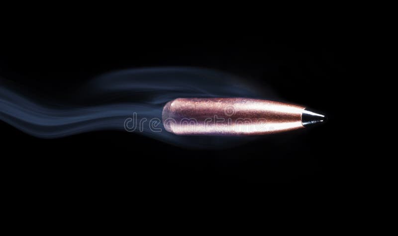 Bullet with smoke trailing behind stock images