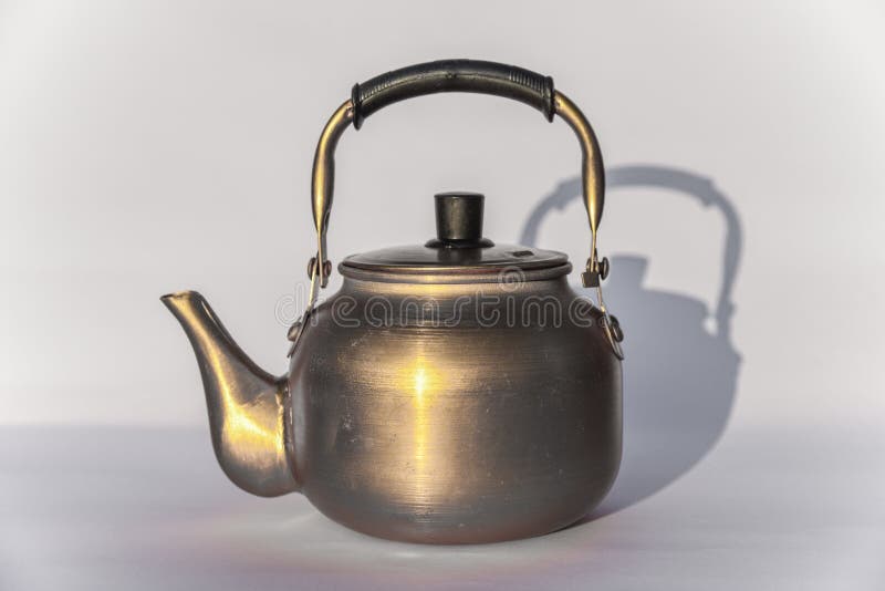 https://thumbs.dreamstime.com/b/copper-desert-tea-pot-antique-metal-teapot-isolated-white-background-antique-kettle-golden-teapot-metal-teapot-chinese-teapot-222263374.jpg