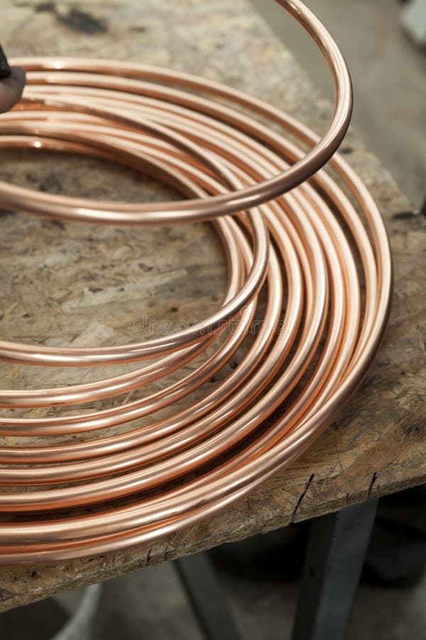 Bent New Copper Pipes Laying on Concrete Floor Stock Image Image of