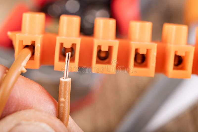 Copper wires and electrical connectors. Electrical accessories in the home workshop stock image