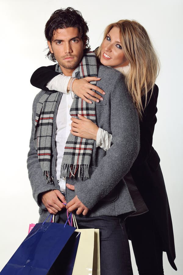 Coppie felici dei modelli di moda immagini stock Coppie felici dei modelli di moda immagini stock
