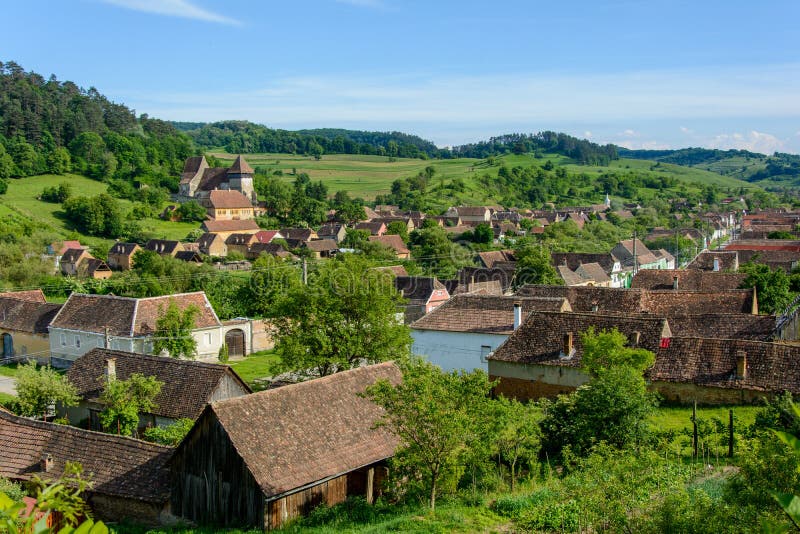 Copsa Mare saxon village with his fortified church, near Biertan, Sibiu county, Transylvania, Romania. Copsa Mare is a medieval saxon village near Biertan stock photos Copsa Mare saxon village with his fortified church, near Biertan, Sibiu county, Transylvania, Romania. Copsa Mare is a medieval saxon village near Biertan stock photos
