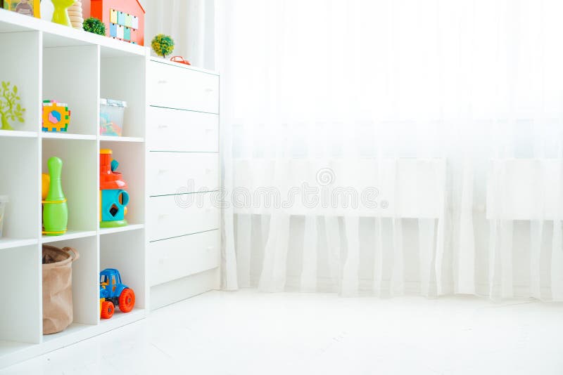 Copy the space of an empty wall in a simple children s room with a white wooden floor and a large and light window