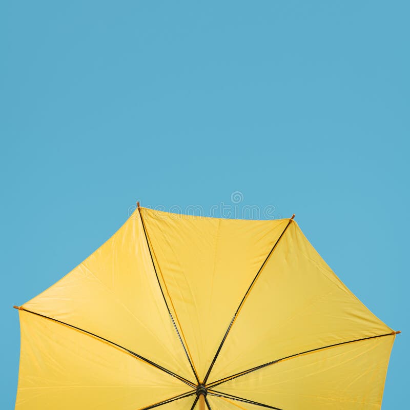 Copy Space Yellow Umbrella. High Quality and Resolution Beautiful Photo