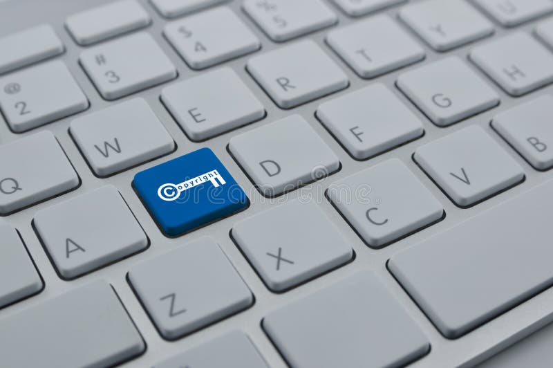 Copyright Key Icon on Modern Computer Keyboard Button, Copyright Stock