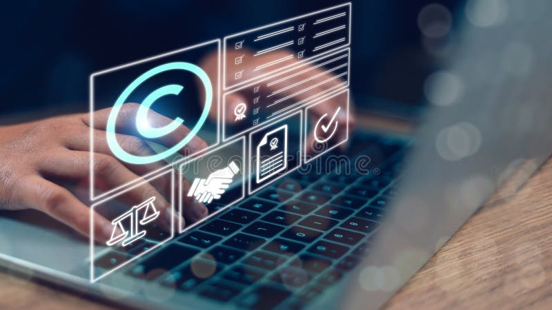 Copyright or patent concept, Person\'s hand using a laptop computer on a futuristic virtual interface screen. copyright icon royalty free stock images