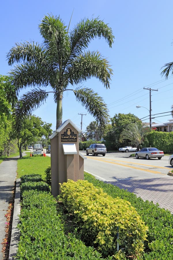 FORT LAUDERDALE, FLORIDA - MAY 10, 2013: Entrance sign into the Coral Ridge Country Club Estates neighborhood of Ft. Lauderdale, Florida north of Oakland Park Boulevard on Bayview Drive on a sunny day. FORT LAUDERDALE, FLORIDA - MAY 10, 2013: Entrance sign into the Coral Ridge Country Club Estates neighborhood of Ft. Lauderdale, Florida north of Oakland Park Boulevard on Bayview Drive on a sunny day