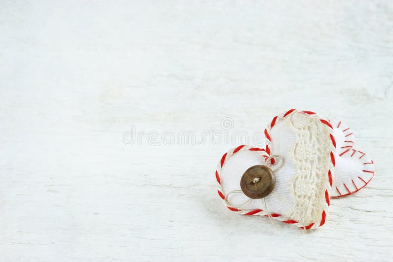 Handmade Valentines day hearts on white wooden background. Handmade Valentines day hearts on white wooden background