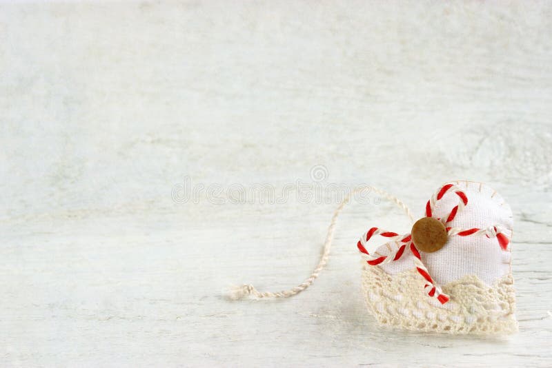 Handmade Valentines day heart on white wooden background. Handmade Valentines day heart on white wooden background