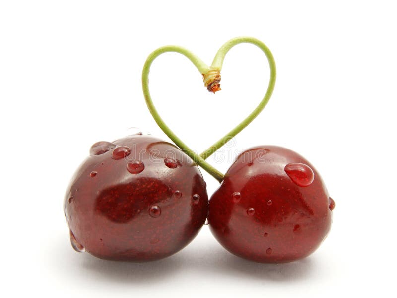 Corazón-dimensión de una variable del palillo de la cereza fotografía de archivo Corazón-dimensión de una variable del palillo de la cereza fotografía de archivo