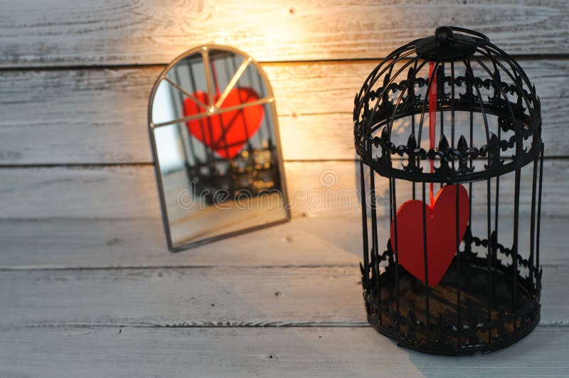 Corazón prisionero en birdcage