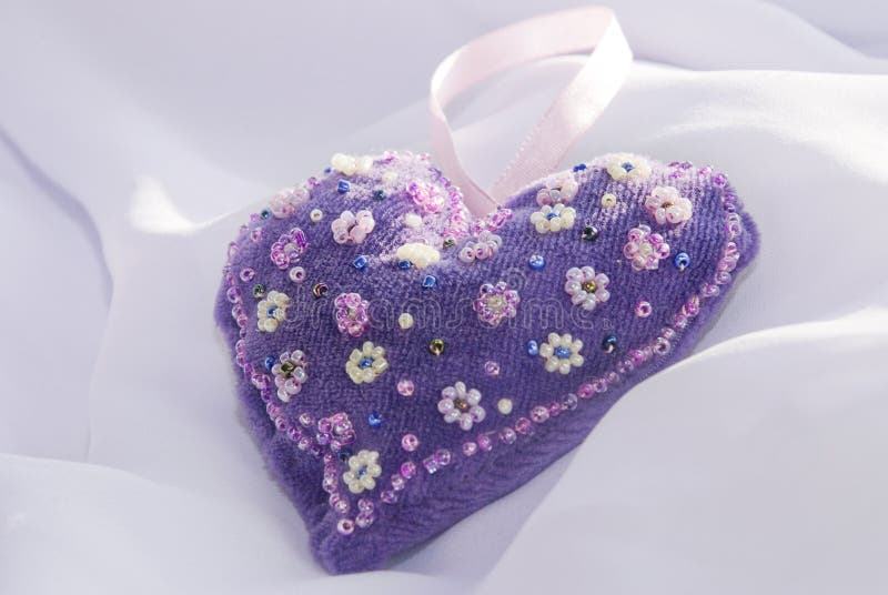 Velvet heart embroidered with beaded flowers. Velvet heart embroidered with beaded flowers