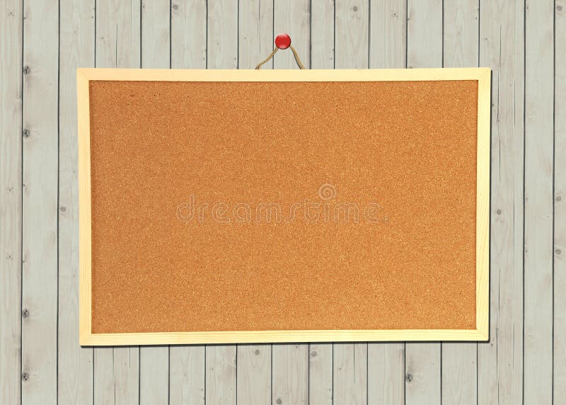 Cork bulletin board on wood wall