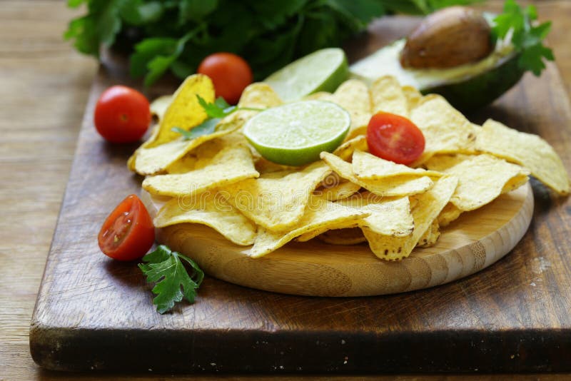 Corn chips nachos stock image. Image of bowl, wooden 91792835