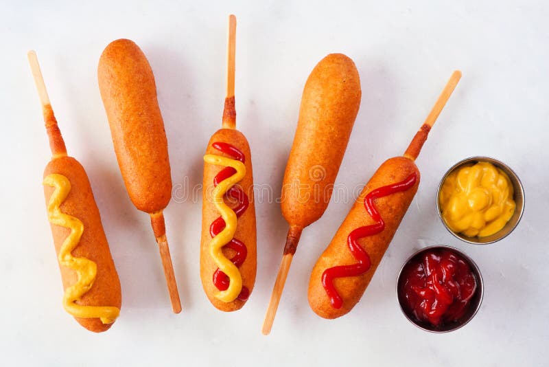 Corn Dogs with a Variety of Toppings Over White Marble Stock Photo Image of fair, mustard