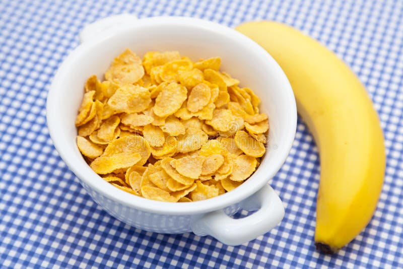 Corn flakes with banana stock image. Image of food, white - 27024299