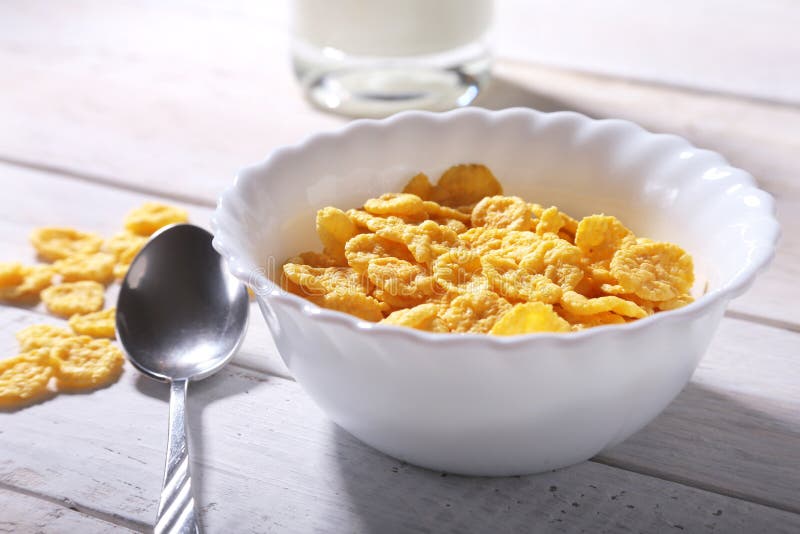 Corn Flakes Cereal in a Bowl and Glass with Milk. Morning Breakfast. Stock Image Image of