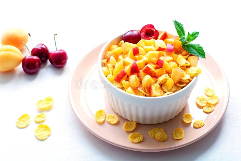 Healthy Breakfast with Cornflakes and Pieces of Fruit, Cherries on a