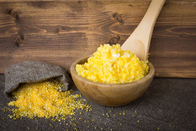 Cooked Corn Grits in Bowl with Butter. Stock Photo Image of meal