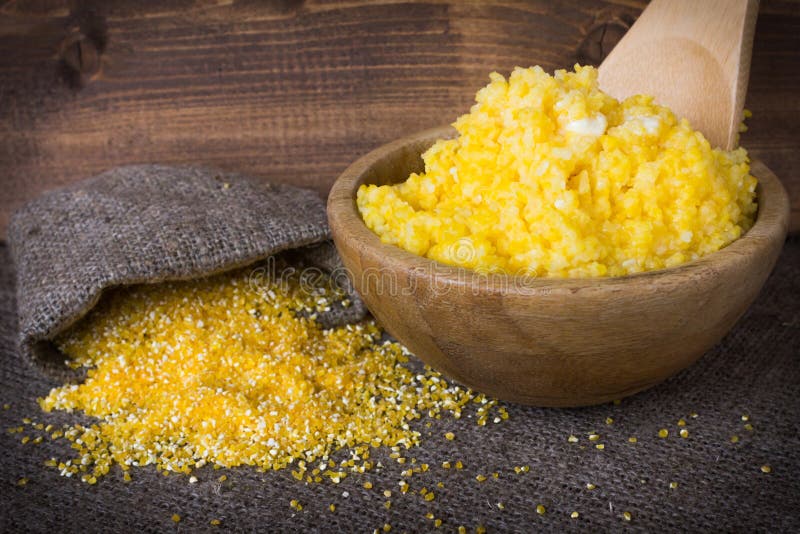 Cooked Corn Grits in Bowl with Butter. Stock Photo Image of meal