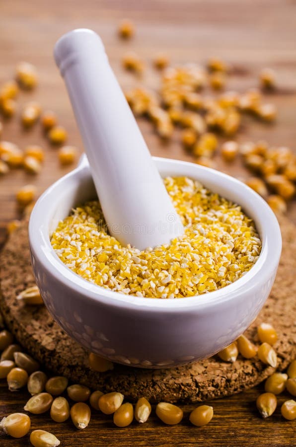 Corn grits and seeds stock image. Image of healthy, flour 86519165