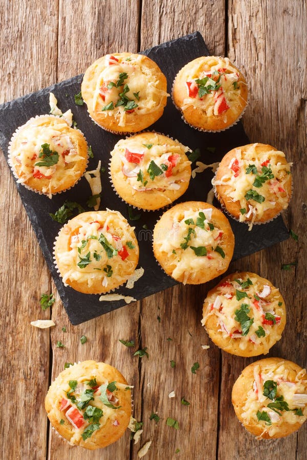 Corn Muffins with Crab Meat and Cheese Closeup on a Slate Board